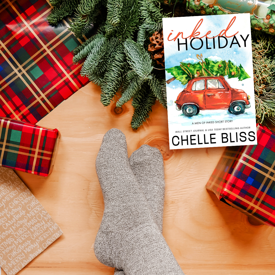 inked holiday paperback book red car with christmas tree on roof