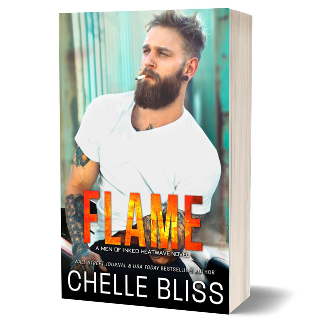flame paperback book man in white t-shirt