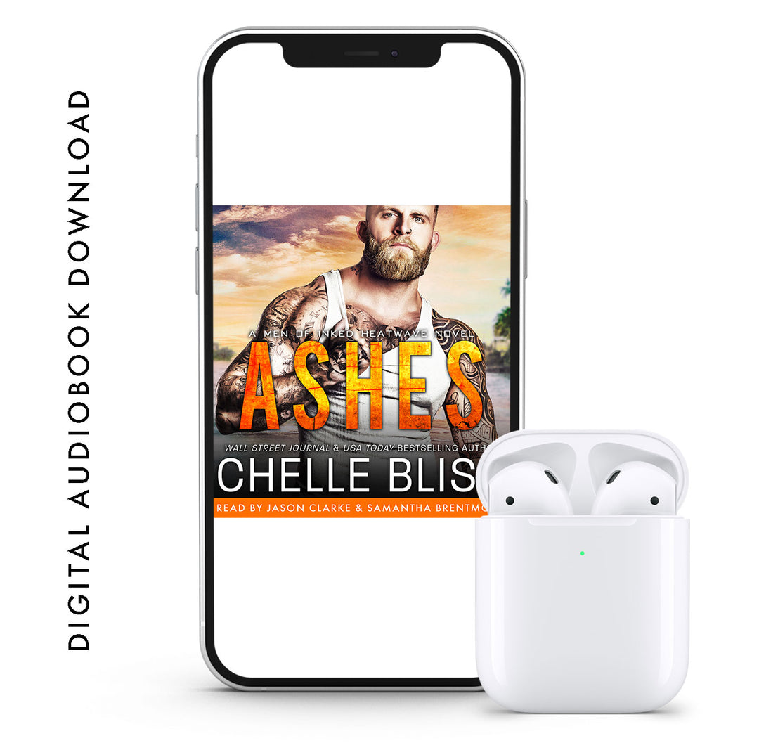 A phone displaying a book cover with the title 'Ashes' by Chelle Bliss, and a pair of white wireless earbuds next to it.