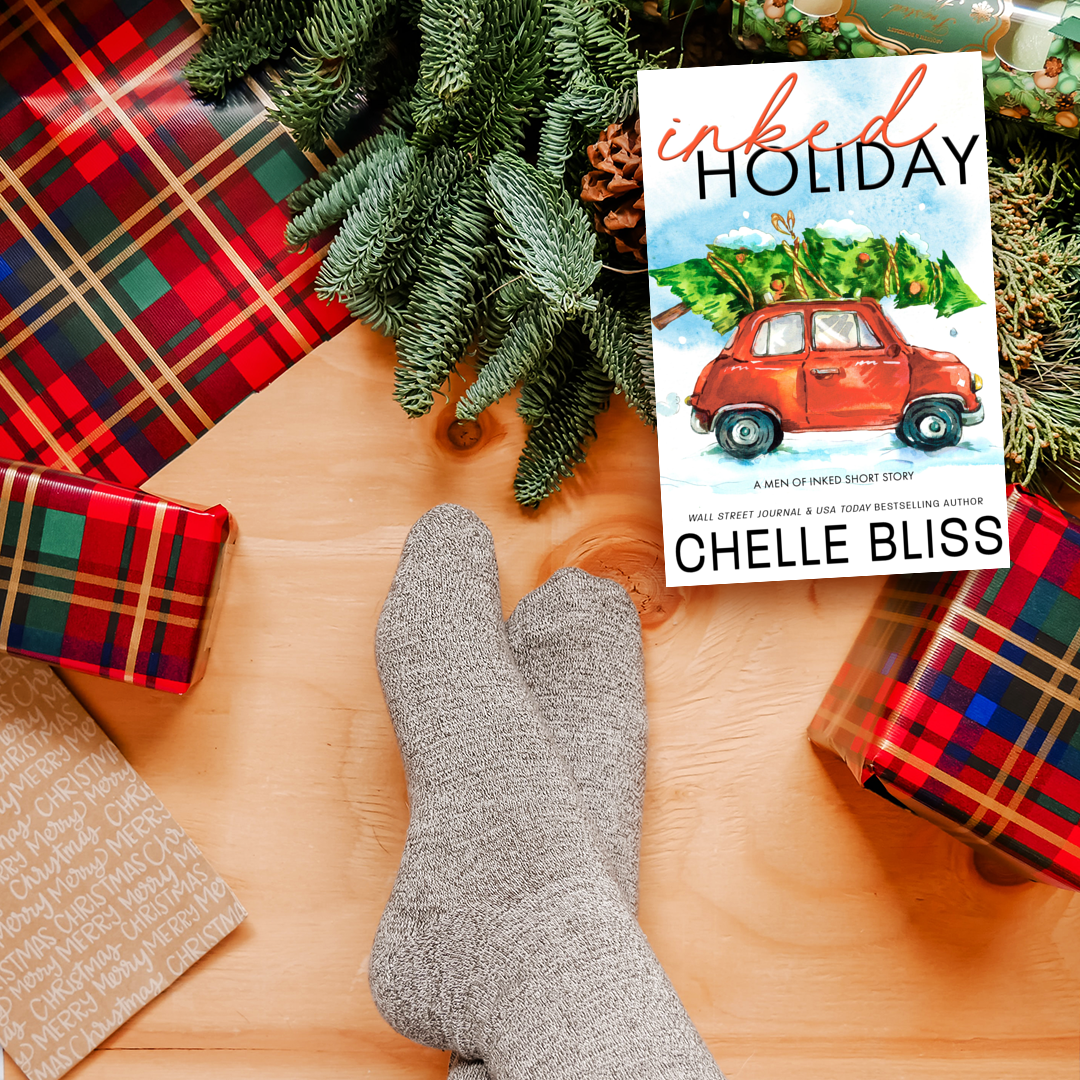 inked holiday paperback book red car with christmas tree on roof 