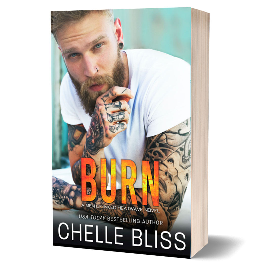 Burn paperback book by chelle bliss Tattooed Man staring at the camera