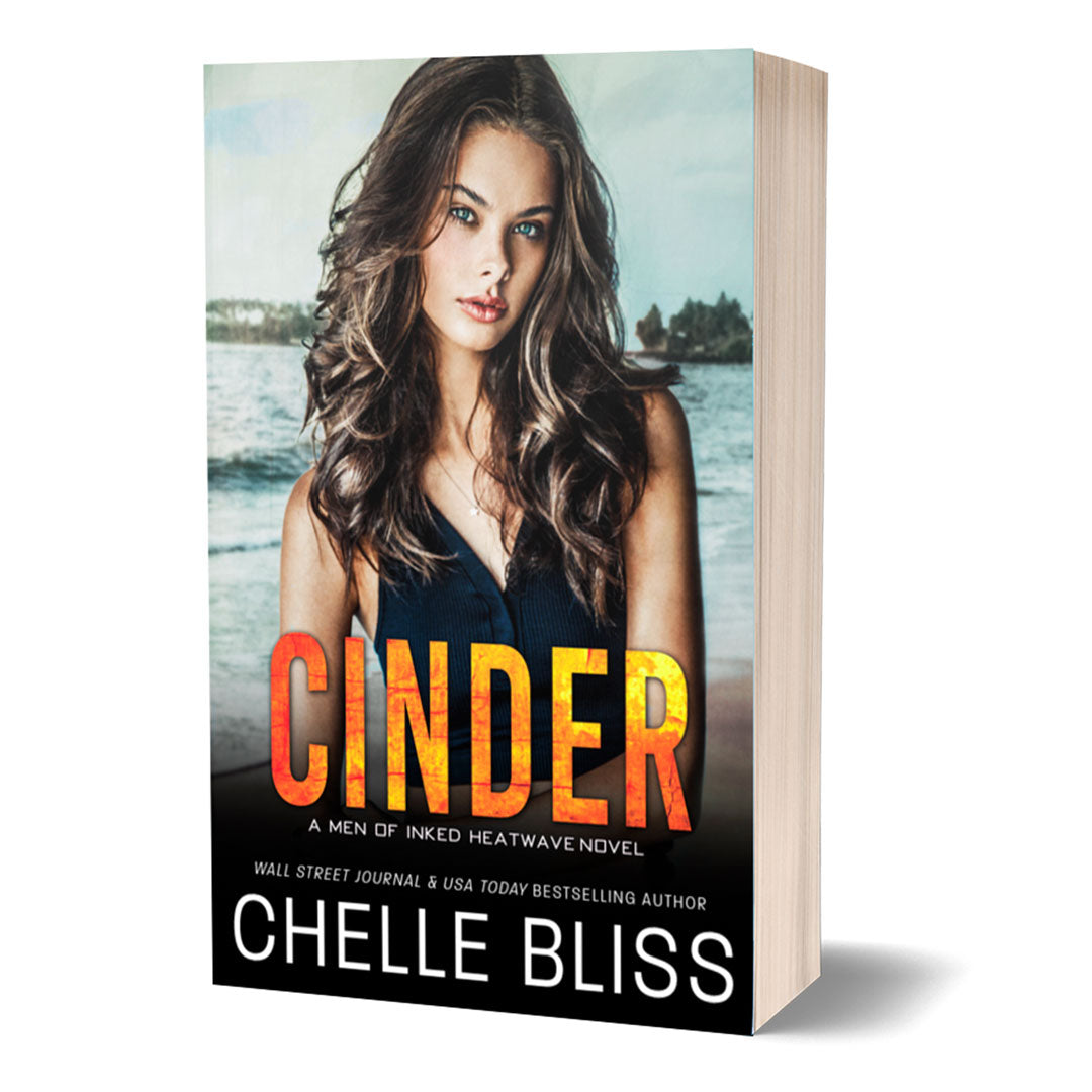 Cinder paperback book by chelle bliss pretty woman looking at the camera on the beach