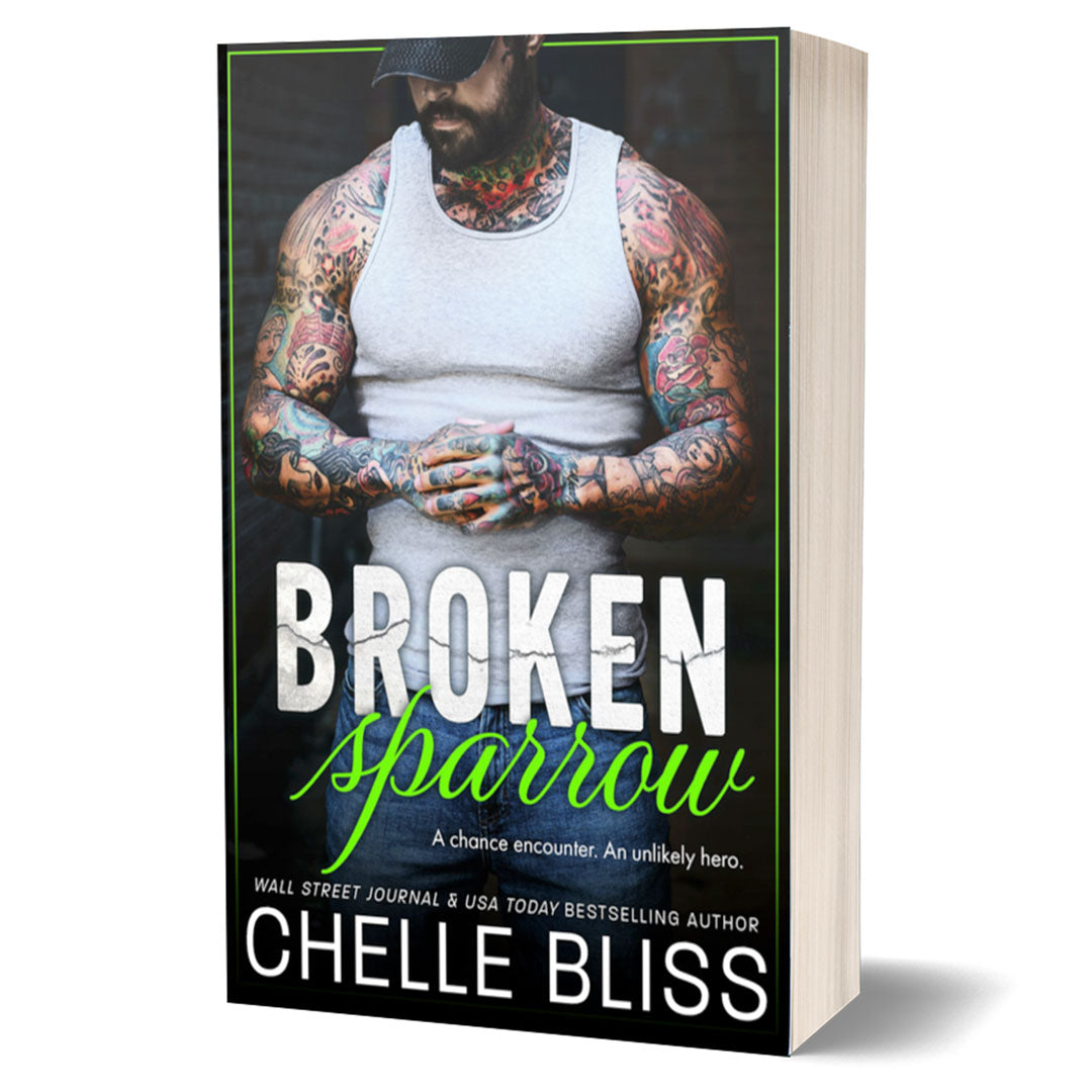 paperback book by chelle bliss tattooed man in white tank top