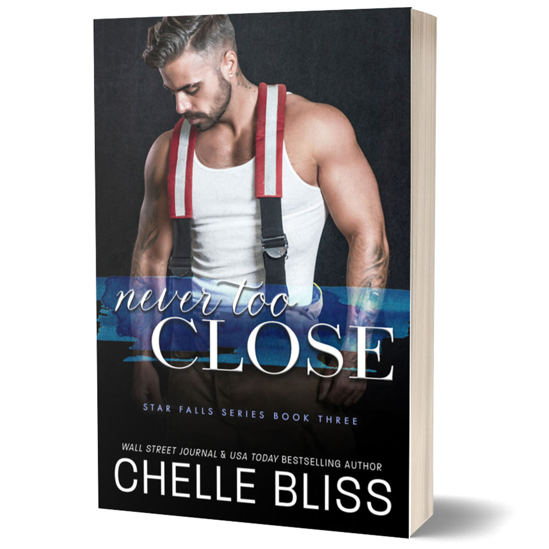 Paperback cover of the book 'Never Too Close' featuring a man in firefighter gear on the front, with the title and author's name, Chelle Bliss, prominently displayed.